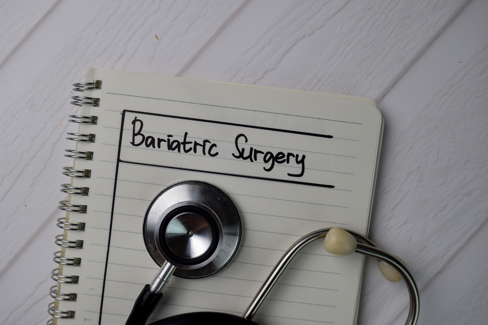 Bariatric Surgery written in pen on a notepad with a stethoscope on the notepad